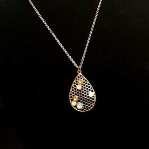Honeycomb pendant with stones